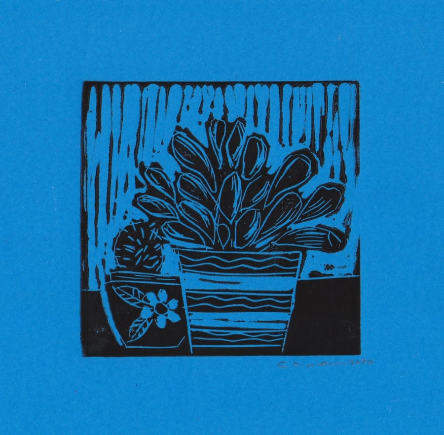 House Plant lino print on a blue back ground
