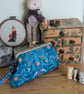 Botanical wristlet clutch purse in Rifle Paper fabric with hand stitched frame - Image 1