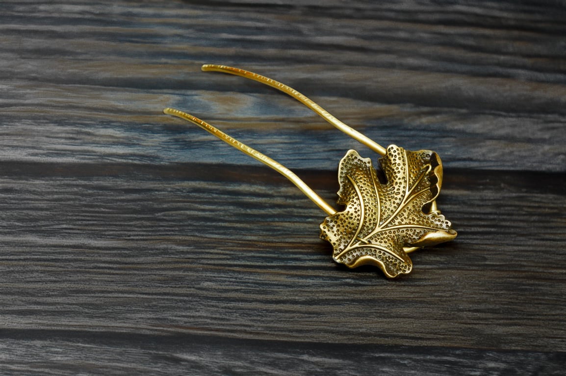 Vintage- antique brass leaf hair fork—an elegant two-prong bun pin