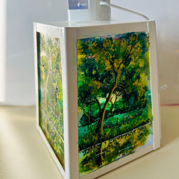 A hand painted and fired glass and metal lantern by Andrew Jenkins 