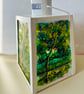 A hand painted and fired glass and metal lantern by Andrew Jenkins 