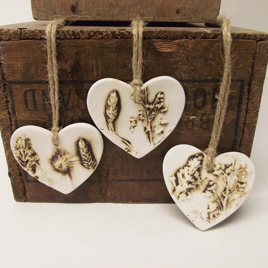 Set of three natural flower ceramic heart decorations Pottery 