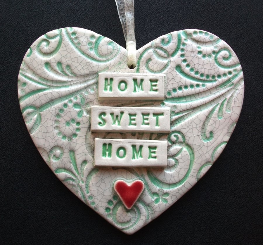 Green ceramic heart decoration Home Sweet Home.