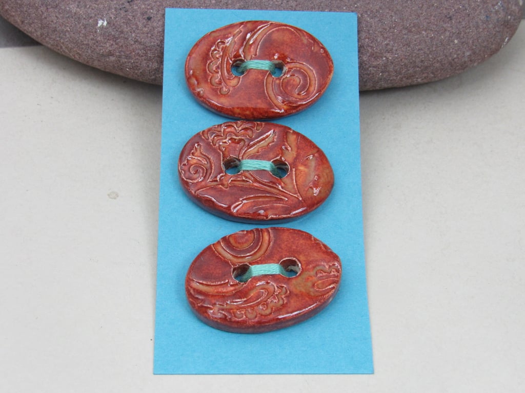 3 Medium Oval Bright Copper Brocade Pattern Ceramic Buttons