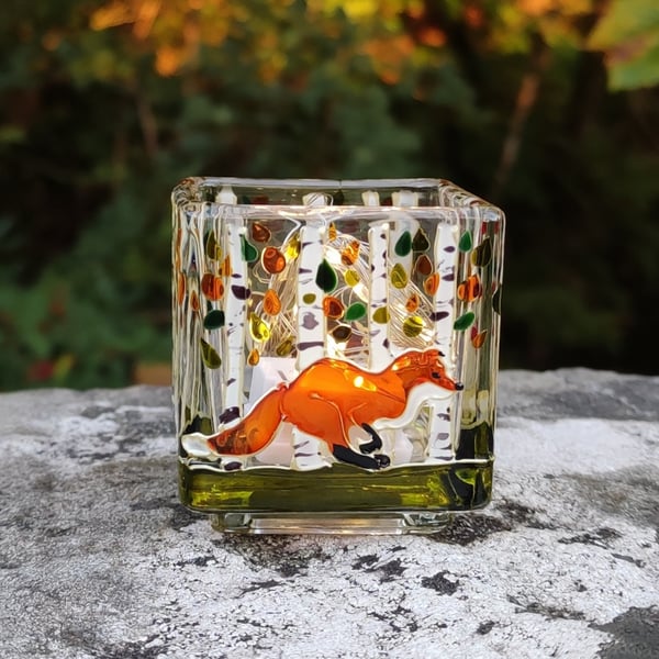 Hand painted glass candle holder, foxes running in the autumn birch woods