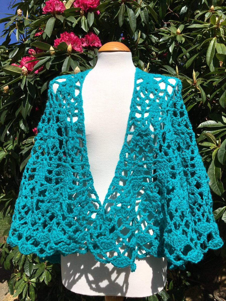 Crescent shaped handmade shawl in vibrant jade green 