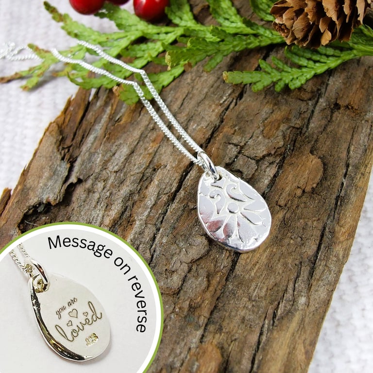 Silver Pebble Necklace. Flower Pattern with Engraved Message