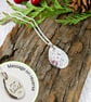 Silver Pebble Necklace. Flower Pattern with Engraved Message