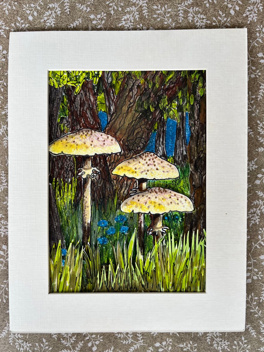 Cut paper collage toadstool picture 