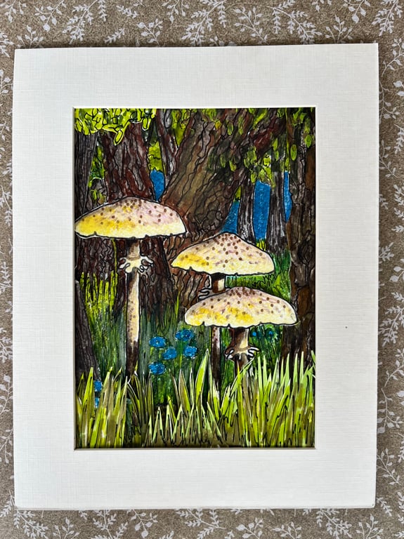 Cut paper collage toadstool picture 