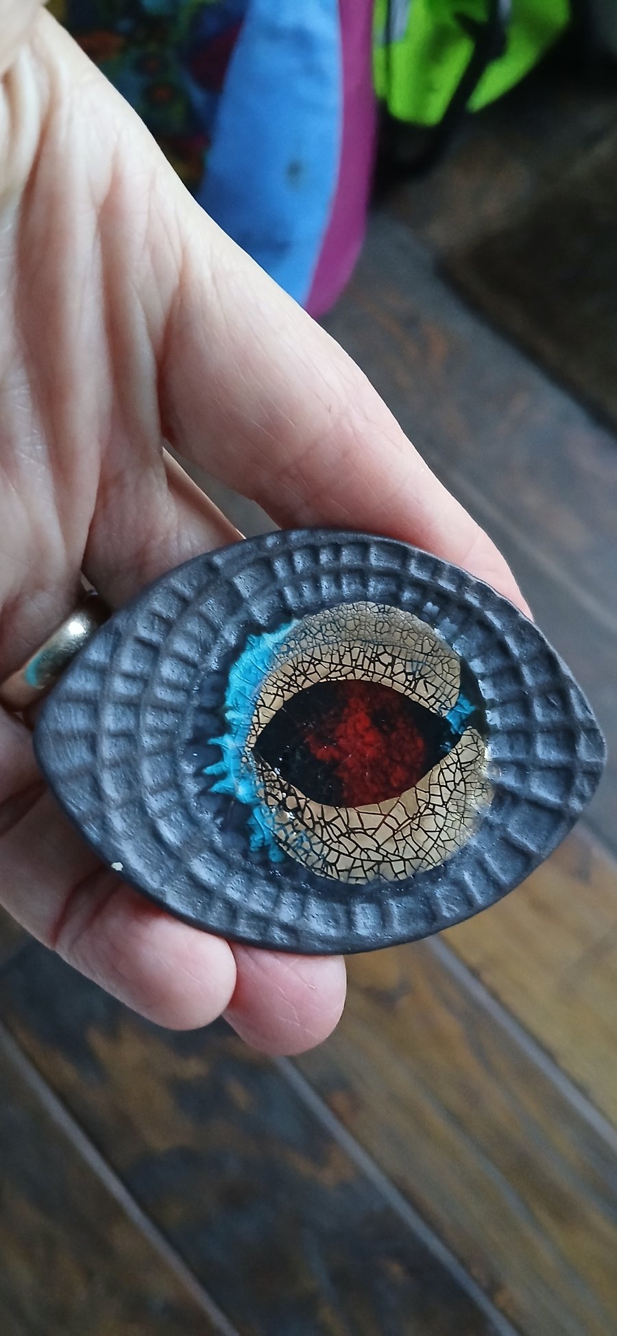 Dragon eye brooch 