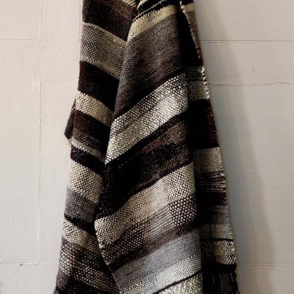 Luxury handwoven throw in handspun wool.