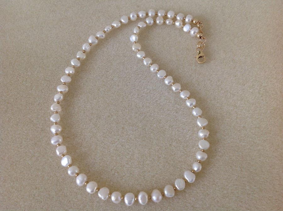 Ivory white freshwater baroque pearl and 14k gold filled necklace.