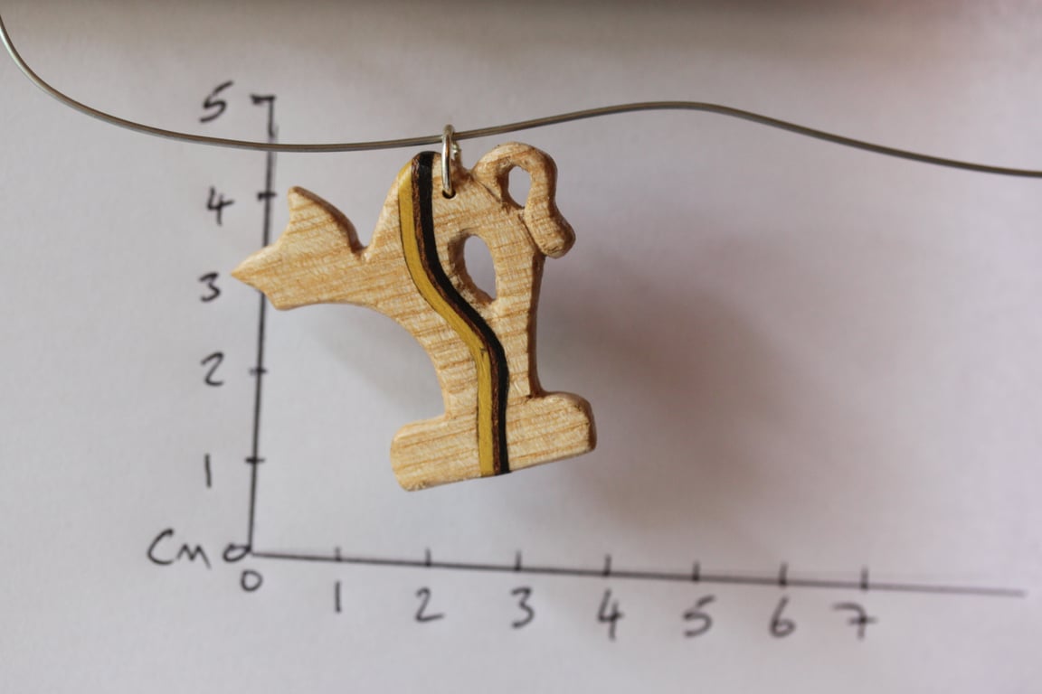 Cat Pendant made from Ash with a lemon wood and ebony veneer