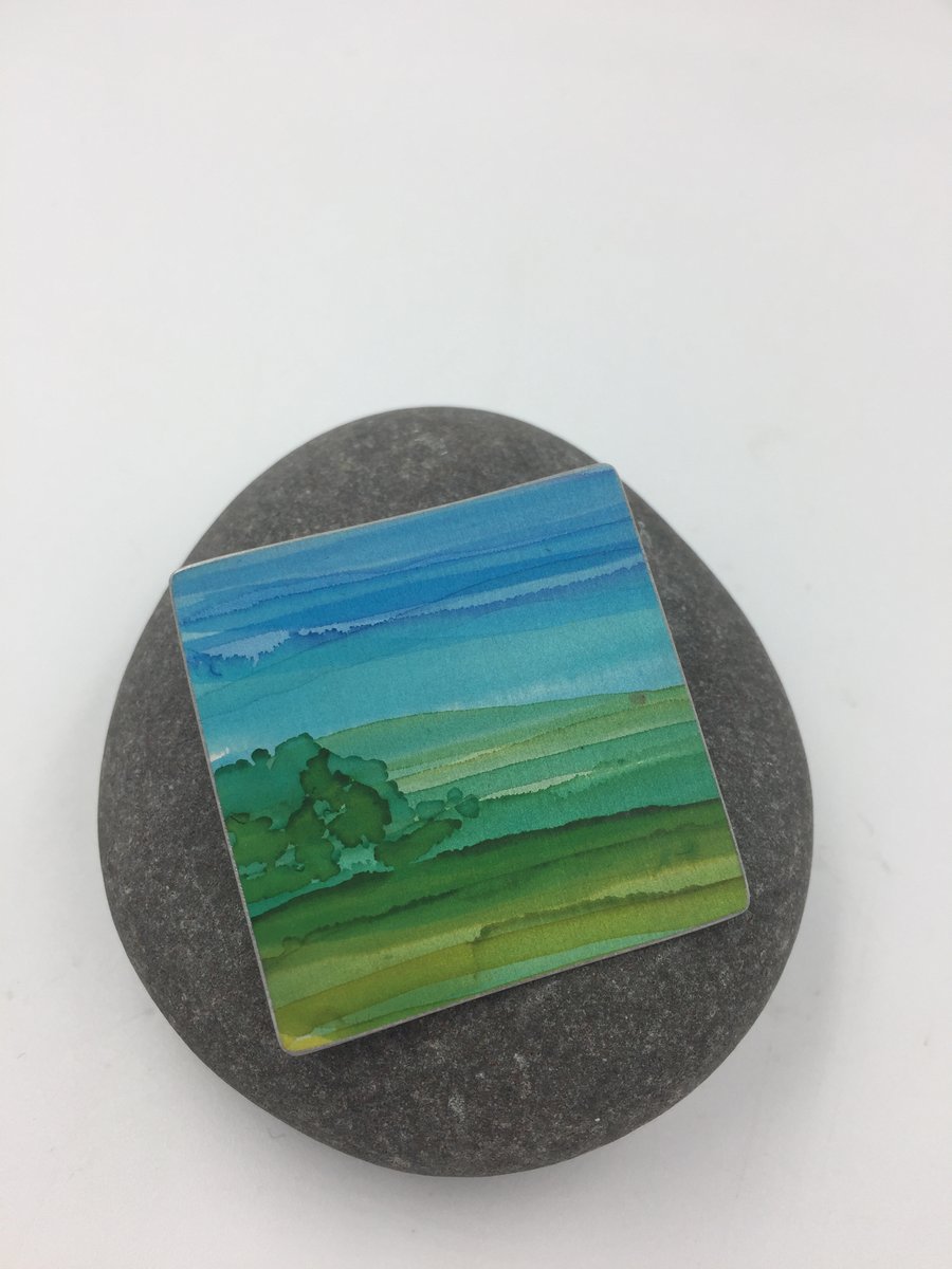 Hand painted anodised aluminium landscape brooch 