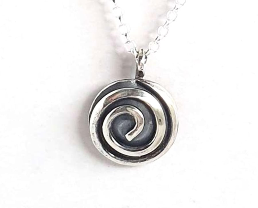 Single spiral silver pendant - celtic design
