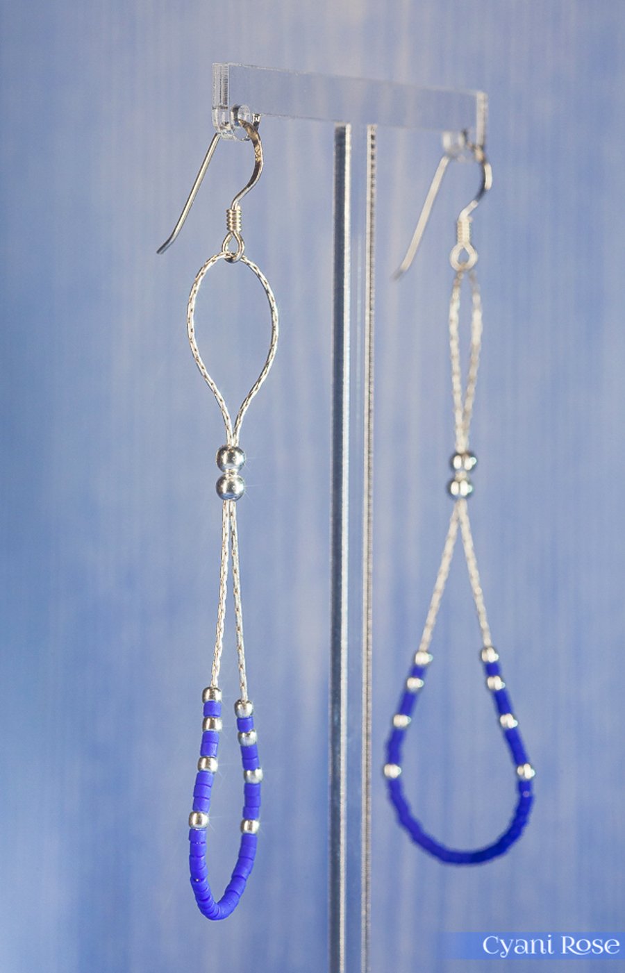 Drop earrings with silver chain, beads and dark blue seed beads 