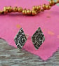 Silver tulip pattern ear studs - Image 1