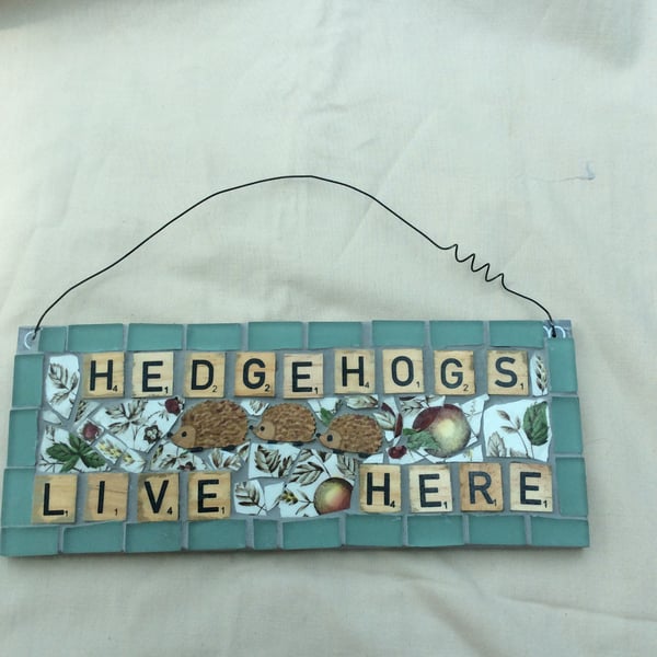 Hedgehogs live here mosaic sign