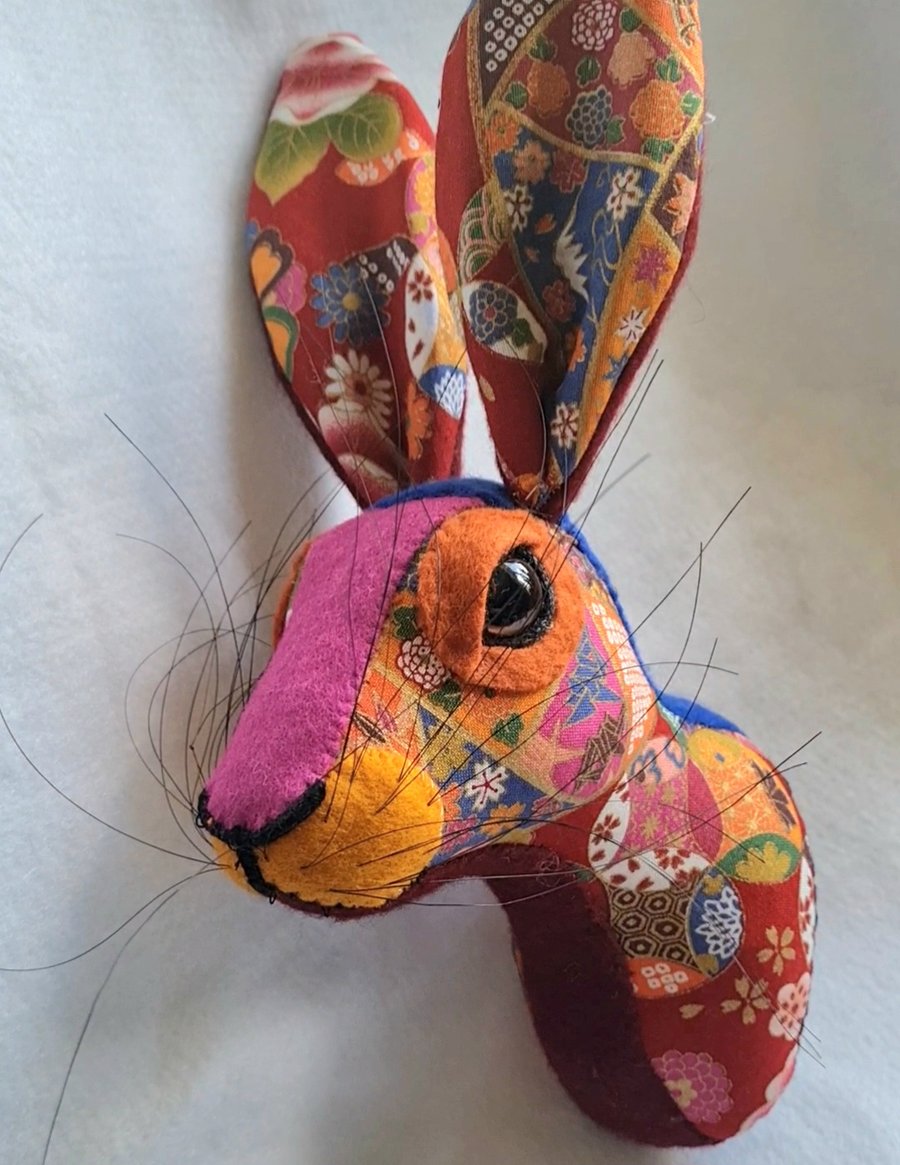 Faux hare head wall mount in exotic fabric