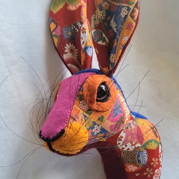Faux hare head wall mount in exotic fabric