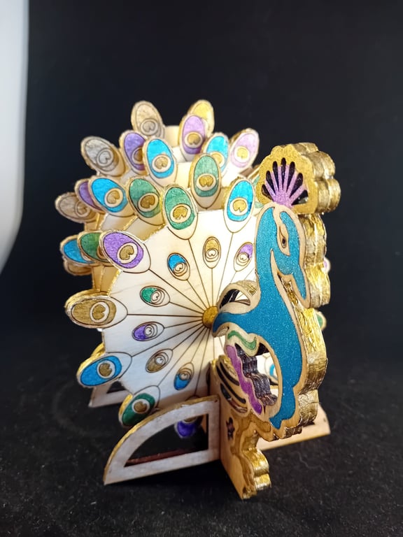 Peacock Coaster with matching stand.