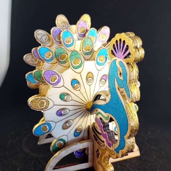 Peacock Coaster with matching stand.