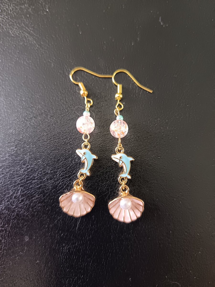 Gold, pastel blue and pink dolphin and shell charm beaded dangle earrings 