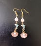 Gold, pastel blue and pink dolphin and shell charm beaded dangle earrings 