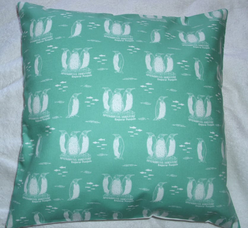 On the Oceans Emperor Penguins cushion