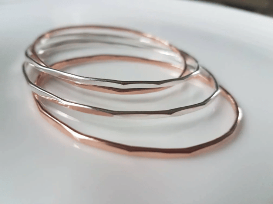 Silver bangle stacking with multi edged finish, copper available too