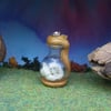 Magical glass flagon with glow-in-the-dark rocks 1.25"  Ann Galvin