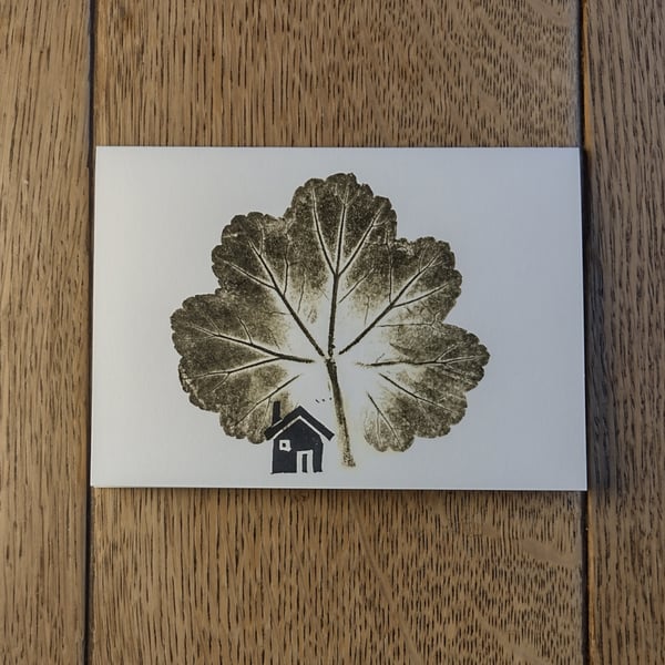 Cabin. Image made on a printing press and a hand made stamp.