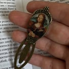 Metal bookmark with cross-stitch embroidery