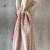 Scandi Style Red and White Drawstring Bottle Bag