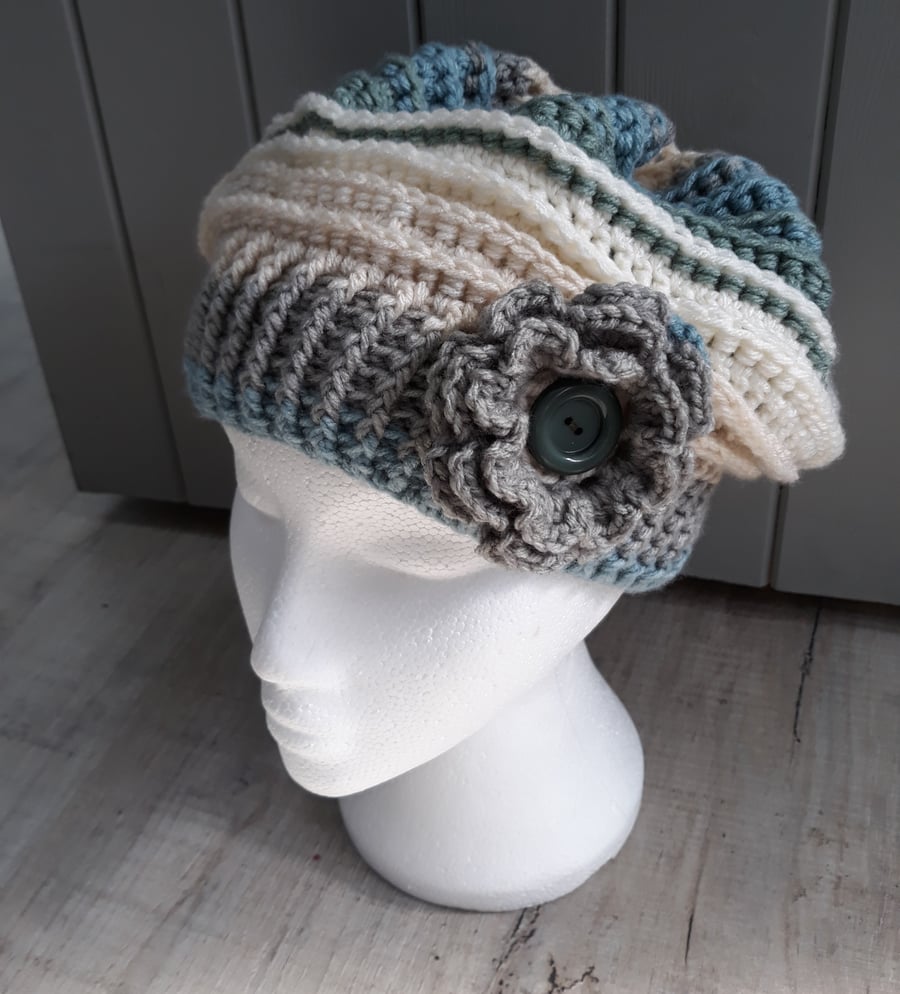 Crochet slouch hat with detachable flower