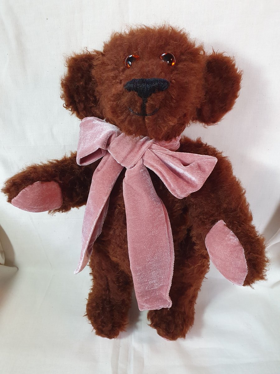 Traditional style handcrafted teddy bear with growler 