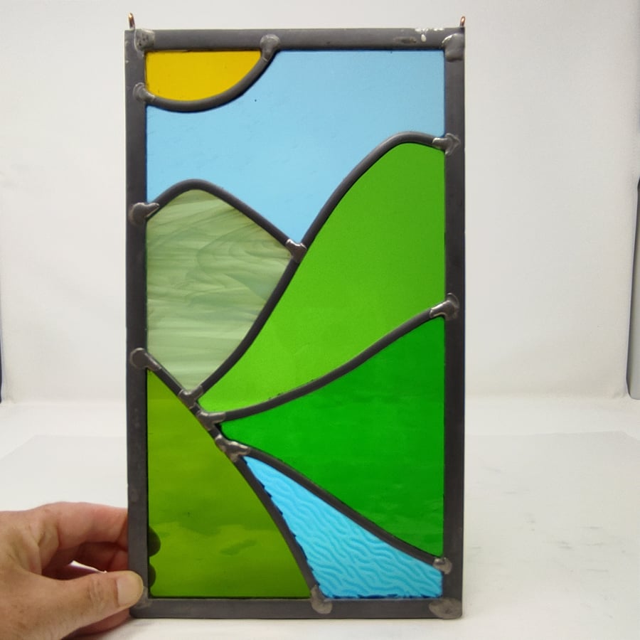 SOLD Stained glass green mountains or hills leaded panel