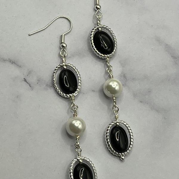Silver plated oval earrings with black obsidian and shell pearls 