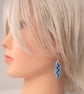 Oval Earrings with wavy line design - Image 2
