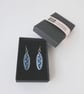 Oval Earrings with wavy line design - Image 8