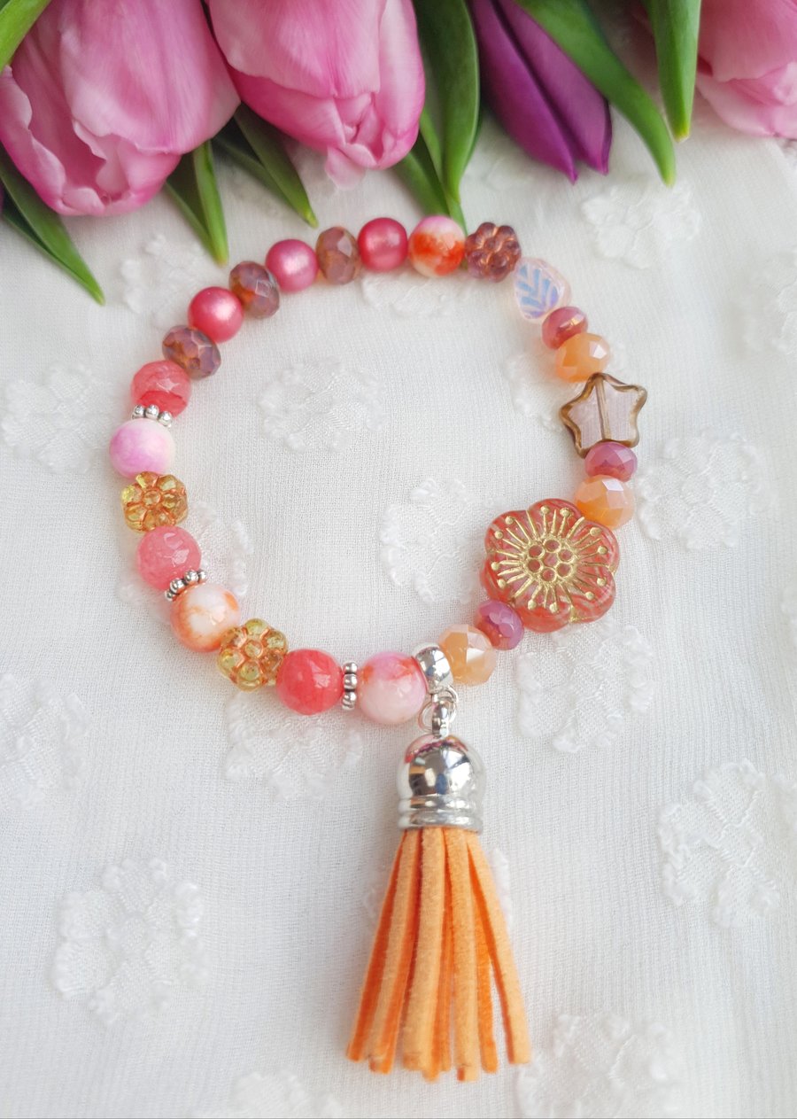 Orange & Amber Flower, Star & Tassel Mixed Bead Stretch Bracelet