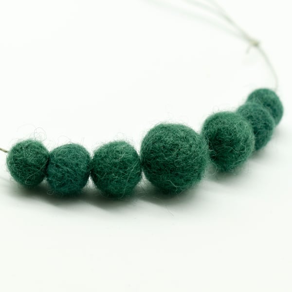Felted bead necklace in green wool