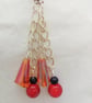 Earrings with Orange Artemis Beads Red and Black Beads on Long Chains - Image 9