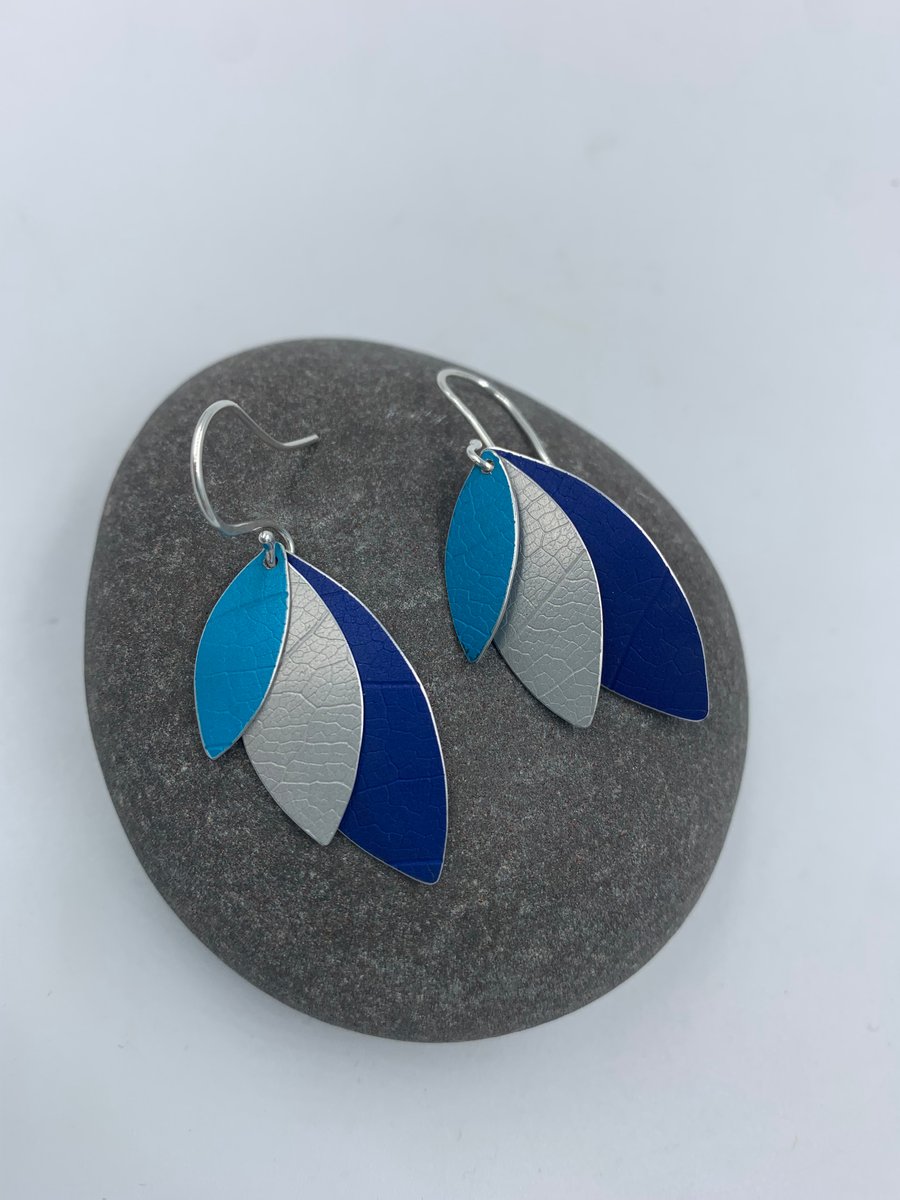 Aluminium layered parrot wing earrings in blue silver and turquoise