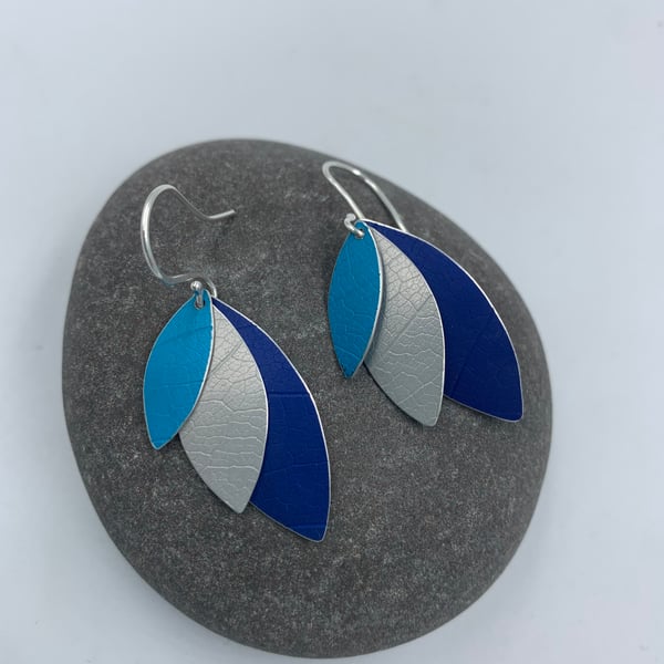 Aluminium layered parrot wing earrings in blue silver and turquoise