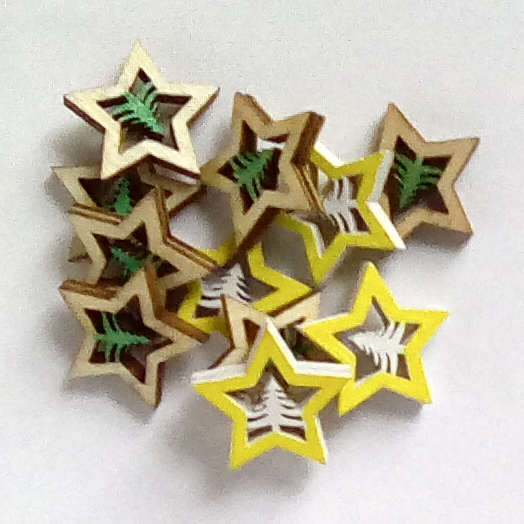 Stars with Christmas trees, wooden embellishments or charms.