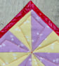 Set of Four Yellow and Purple Spring Flowers and Red Pinwheel Coasters - Image 4