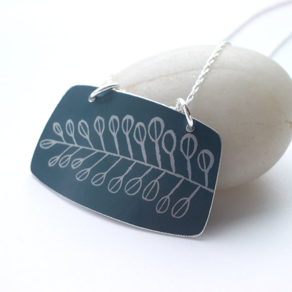 Leaf pendant in black. 