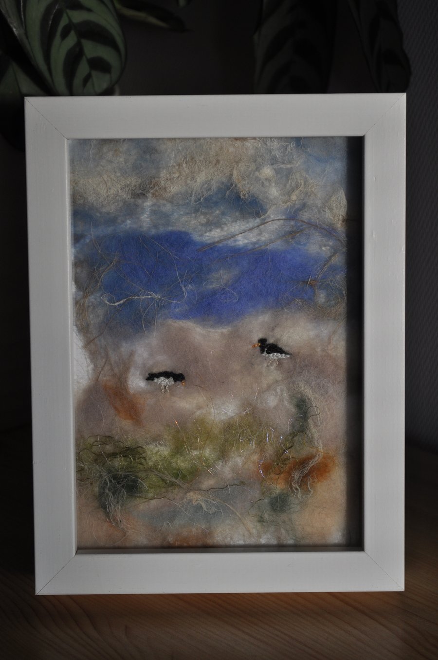 Oystercatcher seascape on handmade silk paper in a frame